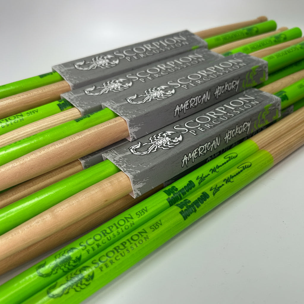 Wooden Scorpion Percussion drumsticks with green venom grip dip and signature printing