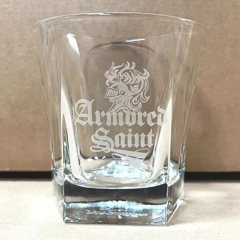 Glass cup with the words 'Armored Saint' etched on the front.