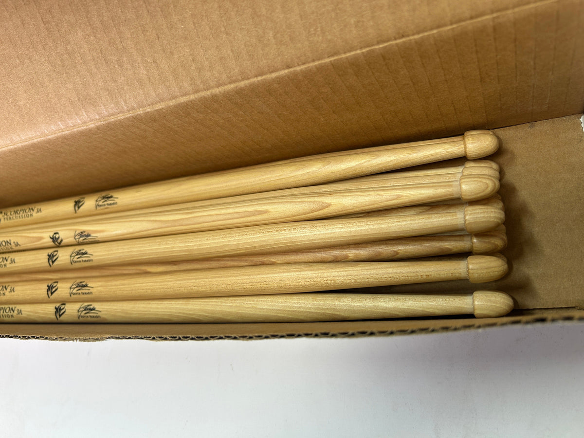 Scorpion Percussion drumsticks in a box